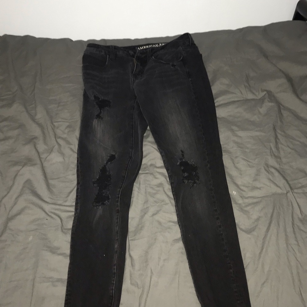 black ripped jeans